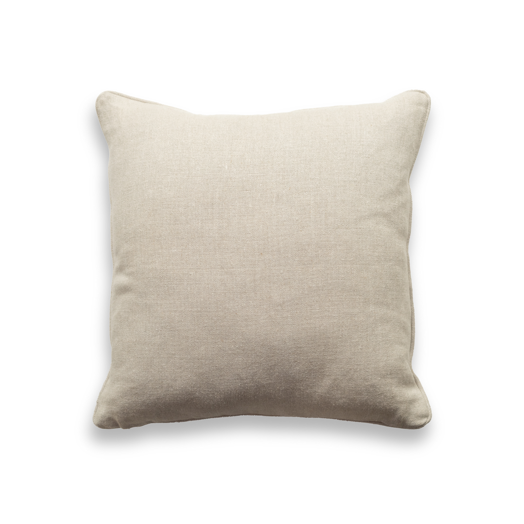Product shot of the back of a decorative cushion which features a neutral textured embroidered fabric.