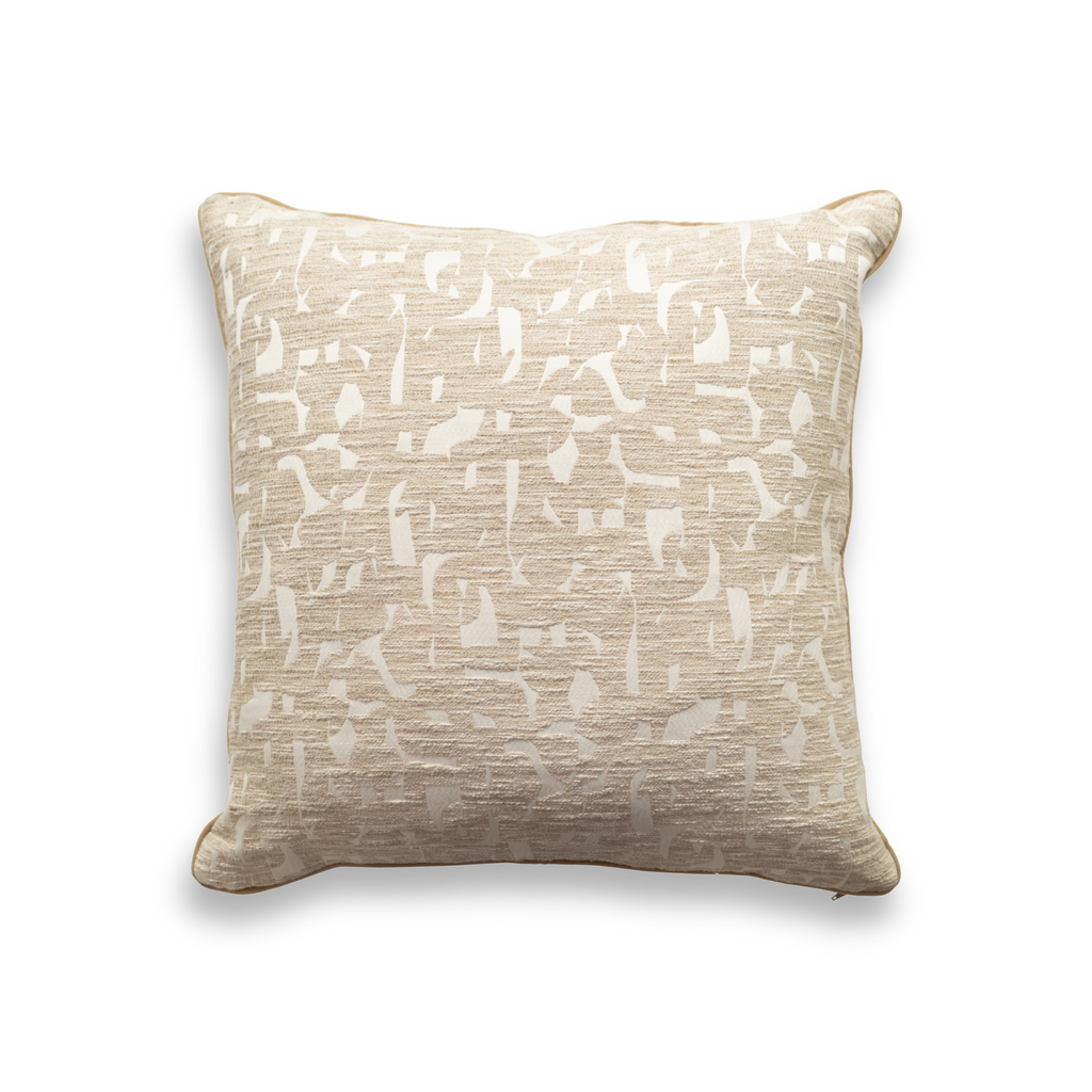 Product shot of the front of a decorative cushion which features a neutral patterned fabric with an elegant piping around the edge of the cushion.