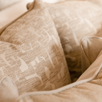 Close-up of a textured beige fabric with a pattern