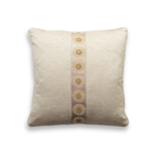 Product shot of the front of a decorative cushion which features a champagne textured fabric base, with an elegant statement trim down the centre which features intricate embroidered patterned.